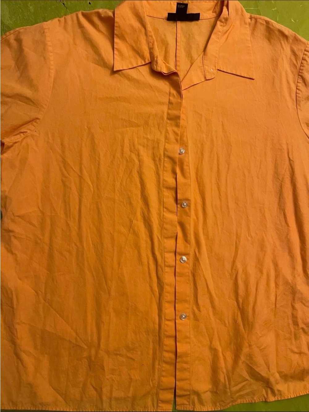 New York & Company peach blouse with a relaxed fit